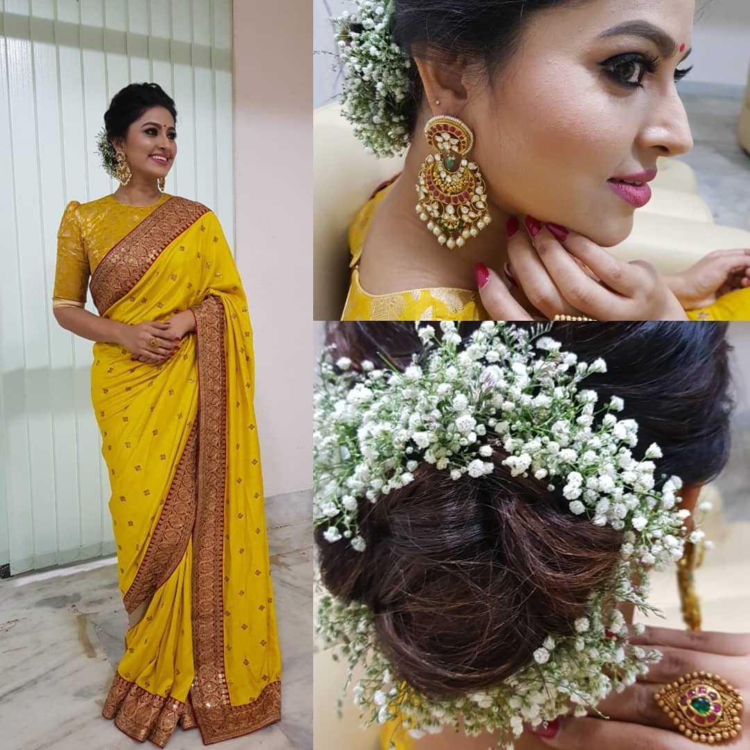 this is the most favourite hairstyle to wear with saree even