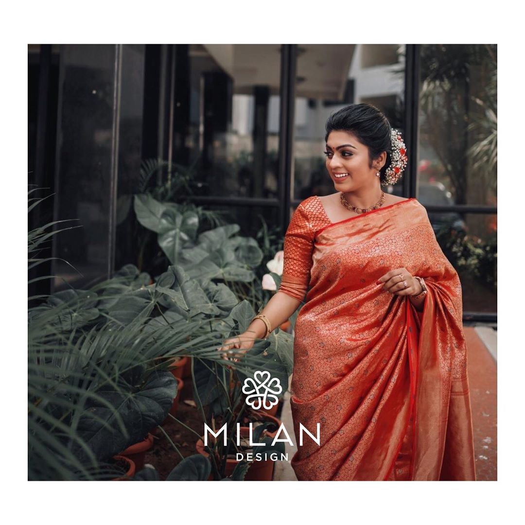 bridesofmilan Sona Mary wearing a pearl cream tulle net saree from  @milandesignkochi's designer saree collection! Choose this full... |  Instagram